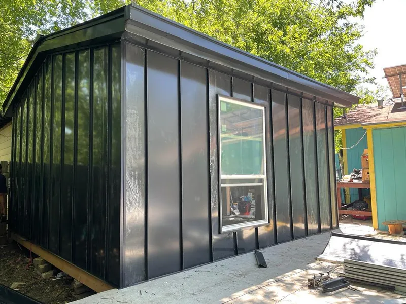 Black standing seam metal wall panels for Roof Inspection in Ocean Pointe