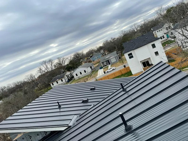 Standing seam metal roof panels with vents for Skylight Repair in Ocean Pointe